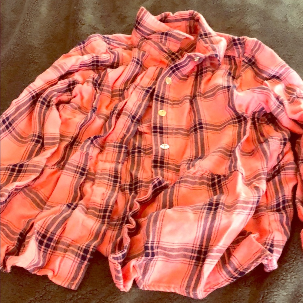 an plaid button down shirt